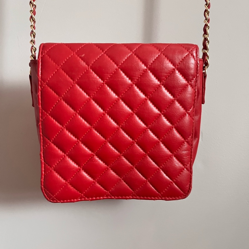 Red leather quilted shoulder bag with chain strap